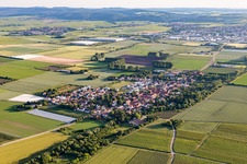 Agricultural land and field borders surround the settlement area of the village in Obersuelzen in the state Rhineland-Palatinate, Germany