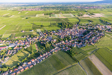 Village view on the edge of agricultural fields and land in Grosskarlbach in the state Rhineland-Palatinate, Germany