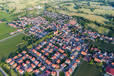 Agricultural land and field borders surround the settlement area of the village in Erpolzheim in the state Rhineland-Palatinate, Germany