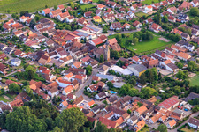 Town center with playground and church in Großfischlingen in the state Rhineland-Palatinate, Germany