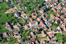 Aerial view of Church building in the village of in Lampertsloch in Grand Est, France