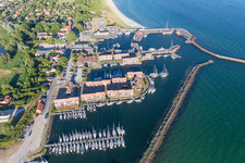 Pleasure boat marina with docks and moorings on the shore area of Baltic Sea in Klintholm Havn in Region Sjaelland, Denmark