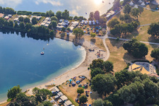 Leisure - Camping Erlichsee on a promontory of the quarry lake in the district Oberhausen in Oberhausen-Rheinhausen in the state Baden-Wuerttemberg, Germany from above