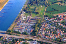 Truck storage on the Rhine in the district Maximiliansau in Wörth am Rhein in the state Rhineland-Palatinate, Germany