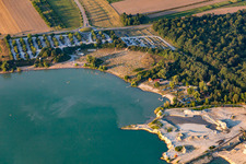 Bathers in and on the beach of Lake Epplesee in the district Silberstreifen in Rheinstetten in the state Baden-Wuerttemberg, Germany