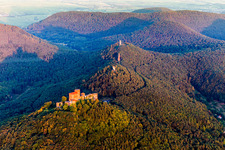 Castle of Trifels and the former fortresses Anebos and Scharfenberg(Muenz) in morning light above the hills of the Pfaelzerwald in Annweiler am Trifels in the state Rhineland-Palatinate, Germany