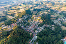 Location view of the streets and houses of residential areas in the valley landscape surrounded by mountains in Lindenfels in the state Hesse, Germany