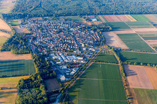 Village view on the edge of agricultural fields and land in Huettenfeld in the state Hesse, Germany