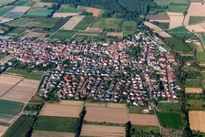 Village view on the edge of agricultural fields and land in Zeiskam in the state Rhineland-Palatinate, Germany