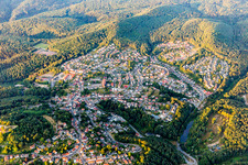Location view of the streets and houses of residential areas in the valley landscape surrounded by mountains in Lemberg in the state Rhineland-Palatinate, Germany