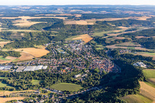 Location view of the streets and houses of residential areas in the Glan valley landscape surrounded by hills in Meisenheim in the state Rhineland-Palatinate, Germany