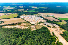 Industrial estate with wind turbine and Arkema GmbH, Siemers Transporttechnik GmbH in the district Volkstorf in Vastorf in the state Lower Saxony, Germany