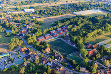 Red apartment buildings on the Sülzbrack and the SCVM sports field in the district Kirchwerder in Hamburg in the state Hamburg, Germany