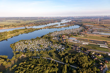 Camping with caravans and tents on the Elbe dyke in the district Ochsenwerder in Hamburg, Germany