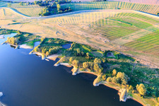Mown meadows behind the dike and groynes in the Elbe in the district Groß Kühren in Amt Neuhaus in the state Lower Saxony, Germany