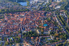 Overview of the old town area and city centre from the south in the evening with Große Bäckerstraße from St. Johannis Lüneburg to St. Nicolai in Lüneburg in the state Lower Saxony, Germany