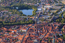 Overview of the old town area from the south in the evening with St. Nicolai and Kreidebergsee in Lüneburg in the state Lower Saxony, Germany