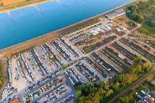 Aerial view of Daimler truck warehouse on the Rhine in the district Maximiliansau in Wörth am Rhein in the state Rhineland-Palatinate, Germany