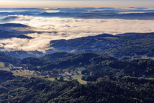 Breitenwiesen district in front of low clouds in the Odenwald in the district Gadernheim in Lautertal in the state Hesse, Germany