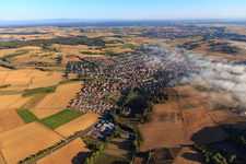 View of the town with low clouds from the south in Groß-Bieberau in the state Hesse, Germany
