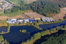 Industrial area at Harres Lake with protonic event partner GmbH and Busser Bauservice & Fuhrbetrieb GmbH in the district Froschhausen in Seligenstadt in the state Hesse, Germany