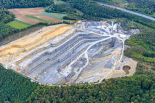Open-cast quarry of Hans Schmitt GmbH - gravel works in the district Machtilshausen in Elfershausen in the state Bavaria, Germany