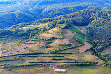Aerial view of Former vineyards on the hillside with fields and hedges in the district Zell am Ebersberg in Knetzgau in the state Bavaria, Germany