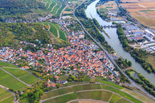 Wine-growing village between vineyards on the banks of the Main from the northeast in Randersacker in the state Bavaria, Germany