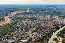 View of the town with railway tracks below the A3 construction site in the district Heidingsfeld in Würzburg in the state Bavaria, Germany