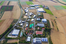 Aerial view of Waltersberg industrial estate with Sonoco Deutschland GmbH in Grünsfeld in the state Baden-Wuerttemberg, Germany