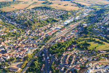 Railway tracks on Güterhallenstraße from the northeast in Osterburken in the state Baden-Wuerttemberg, Germany