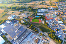 Aerial view of Industrial area Industriestraße with Rothermel warehousing services GmbH logistics center Östringen and Interbran Advanced Materials GmbH in Östringen in the state Baden-Wuerttemberg, Germany