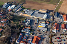 Aerial view of Industrial park Lindelbrunnstraße and Kurfürstenstraße with HORNBACH compact Bad Bergzabern, ZGM Zimmermann-Graeff & Müller GmbH & Co. winery, Jan Ehrhardt automotive repair shop and DEKRA Automobil GmbH station Bad Bergzabern in Bad Bergzabern in the state Rhineland-Palatinate, Germany