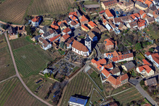 Kirchgasse with cemetery and parish church of St. Peter and Paul in Weyher in der Pfalz in the state Rhineland-Palatinate, Germany