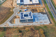 Aerial view of FISCHER and MTS MarkenTechnikService GmbH & Co. KG in Rülzheim in the state Rhineland-Palatinate, Germany