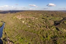 Town over the banks of the river Dordogne in Domme in Nouvelle-Aquitaine, France