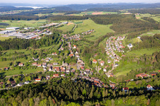 Location view of the streets and houses of residential areas in the valley landscape surrounded by mountains in Betzweiler in the state Baden-Wurttemberg, Germany