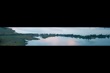 Bridge to the Island Reichenau on the Lake of Constance during sunset in Reichenau in the state Baden-Wurttemberg