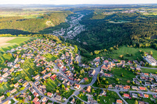 Location view of the streets and houses of residential areas in the valley landscape surrounded by mountains in Weiden in the state Baden-Wurttemberg, Germany
