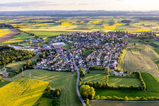 Agricultural land and field borders surround the settlement area of the village in Hochmoessingen in the state Baden-Wurttemberg, Germany