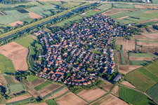 Agricultural land and field borders surround the settlement area of the village in Griesheim in the state Baden-Wurttemberg, Germany
