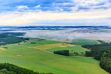 From the southeast under fog in Neuhausen ob Eck in the state Baden-Wuerttemberg, Germany
