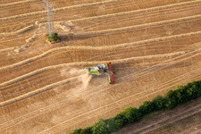 Aerial photograpy of Rapeseed harvest in the district Mühlberg in Drei Gleichen in the state Thuringia, Germany