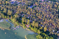 Canoo berths and moorings on the shore area of Conping on Oberuckersee in the district Warnitz in Oberuckersee in the state Brandenburg, Germany