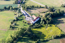 Aerial view of Complex of the hotel building Zeiskamer Muehle in Zeiskam in the state Rhineland-Palatinate, Germany