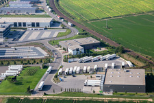 Aerial view of Industrial area in Speyer Valley with Markthalle 5 and Resinnovation GmbH in Rülzheim in the state Rhineland-Palatinate, Germany