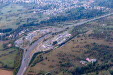 Aerial view of Lorries - parking spaces at the highway rest stop and parking of the A4 Aire de Service AVIA de Saverne-Eckartswiller in Eckartswiller in Grand Est, France