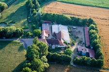 At Erlenbach, Leistenmühle in Kandel in the state Rhineland-Palatinate, Germany viewn from the air