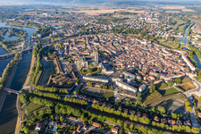 Aerial view of City center in the downtown area on the banks of river course Mosel in Toul in Grand Est, France
