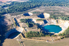 Landslide hole in the shape of a crater filled up with groundwater in Lenoncourt in Grand Est, France